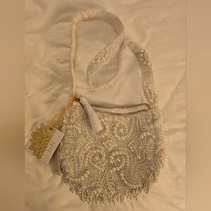 TJ Maxx Marshall’s viral Pearl Beaded Shoulder Bag with Beaded details hanging